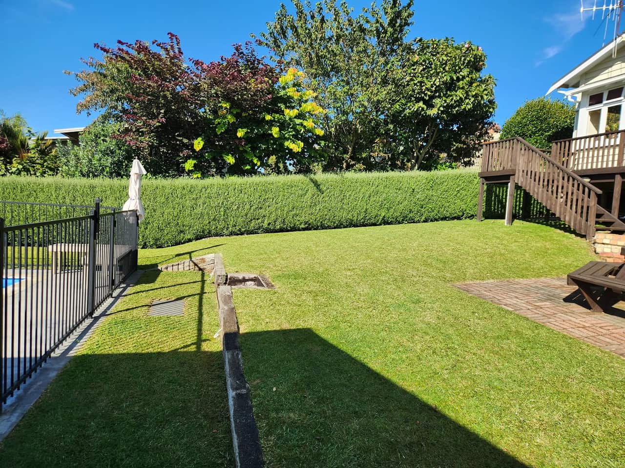 Freshly mowed backyard lawn in Kihikihi